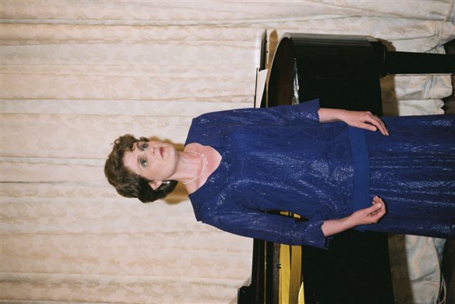 Lisette Wesseling singing in performance pose at Government House, 2005